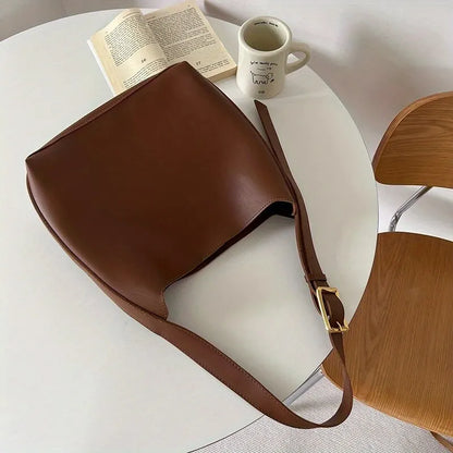 Aria - Sac bandoulière minimaliste en cuir végan